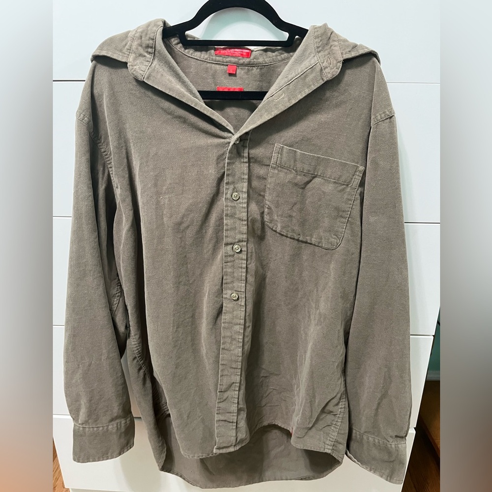 Soft light green button down shirt